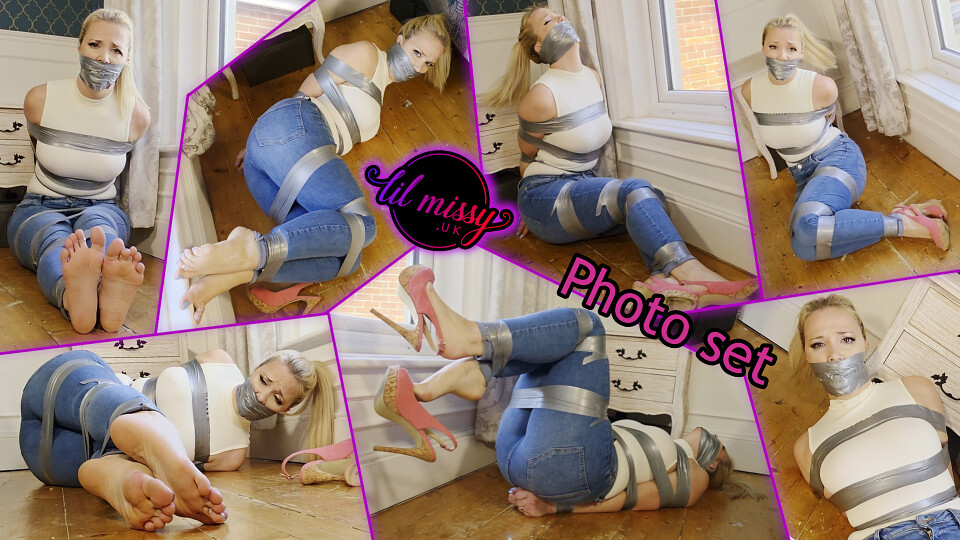 Taped up damsel on the floor in jeans Photo set