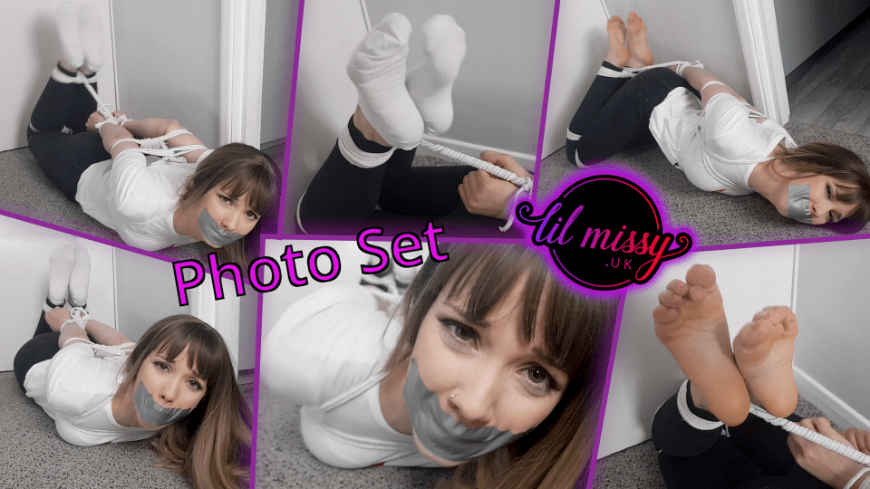 Hogtied in doorway and tape gagged - Photo set