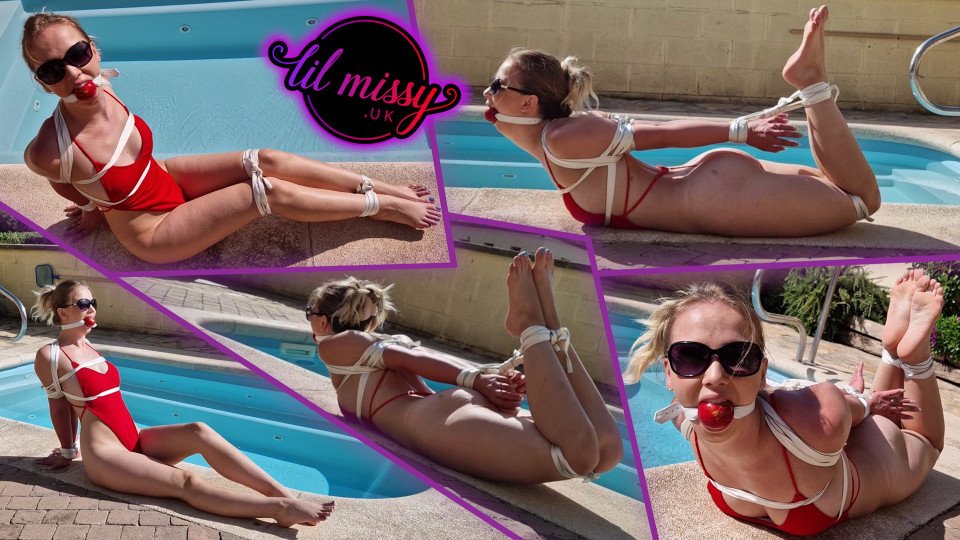 Tied up by the pool in sunglasses